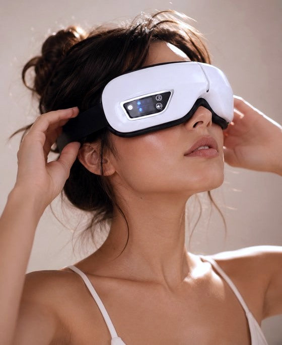 Woman using the Gratia Eye Massager